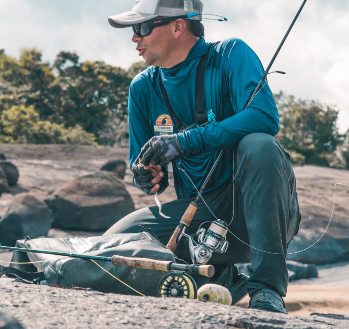 Angler gazing at the horizon on the Orinoco River during a luxury Peacock Bass and Payara fishing expedition by Fishing ByEcolodge in Colombia