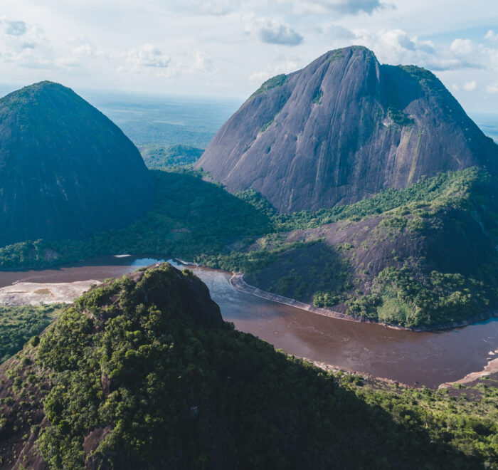 Majestic view of the Mavicure Hills in Guainía, Colombia. Explore the beauty of the Orinoco River on your next fly fishing trip—book today